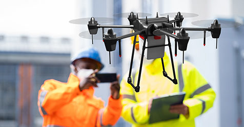 Workers with a drone