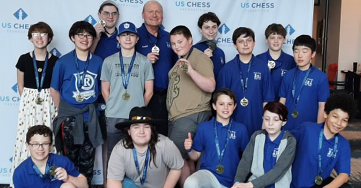 Custodian Chess Coach Leads Students to Victory