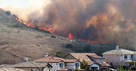 brush fire near houses